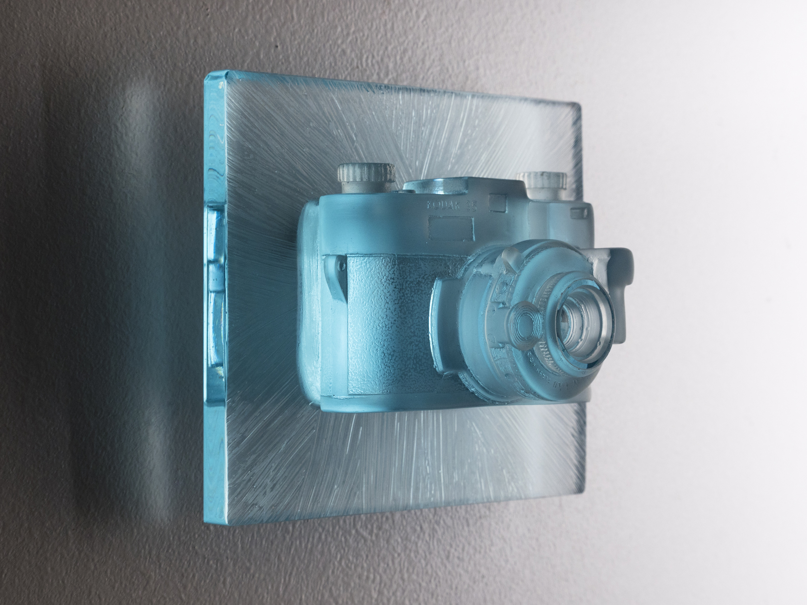 TITLE: Blue Sight MEDIUM: Glass, aluminum METHOD: Cast glass, polished SIZE: 6.5”h x 7.5”w x 6”d DATE: 2017 PHOTO: Josh Hershman