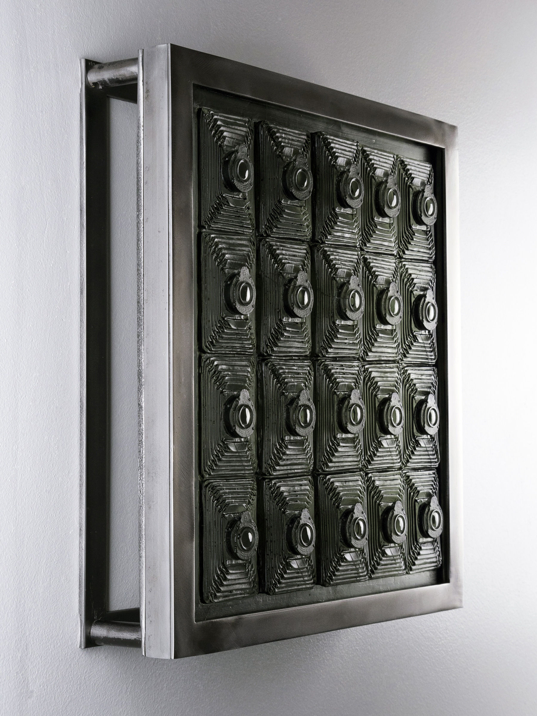 TITLE: Looking Not Seeing MEDIUM: Glass, Steel METHOD: Cast glass, polished SIZE: 17”h X 15”w X 5”d DATE: 2017 PHOTO: Josh Hershman