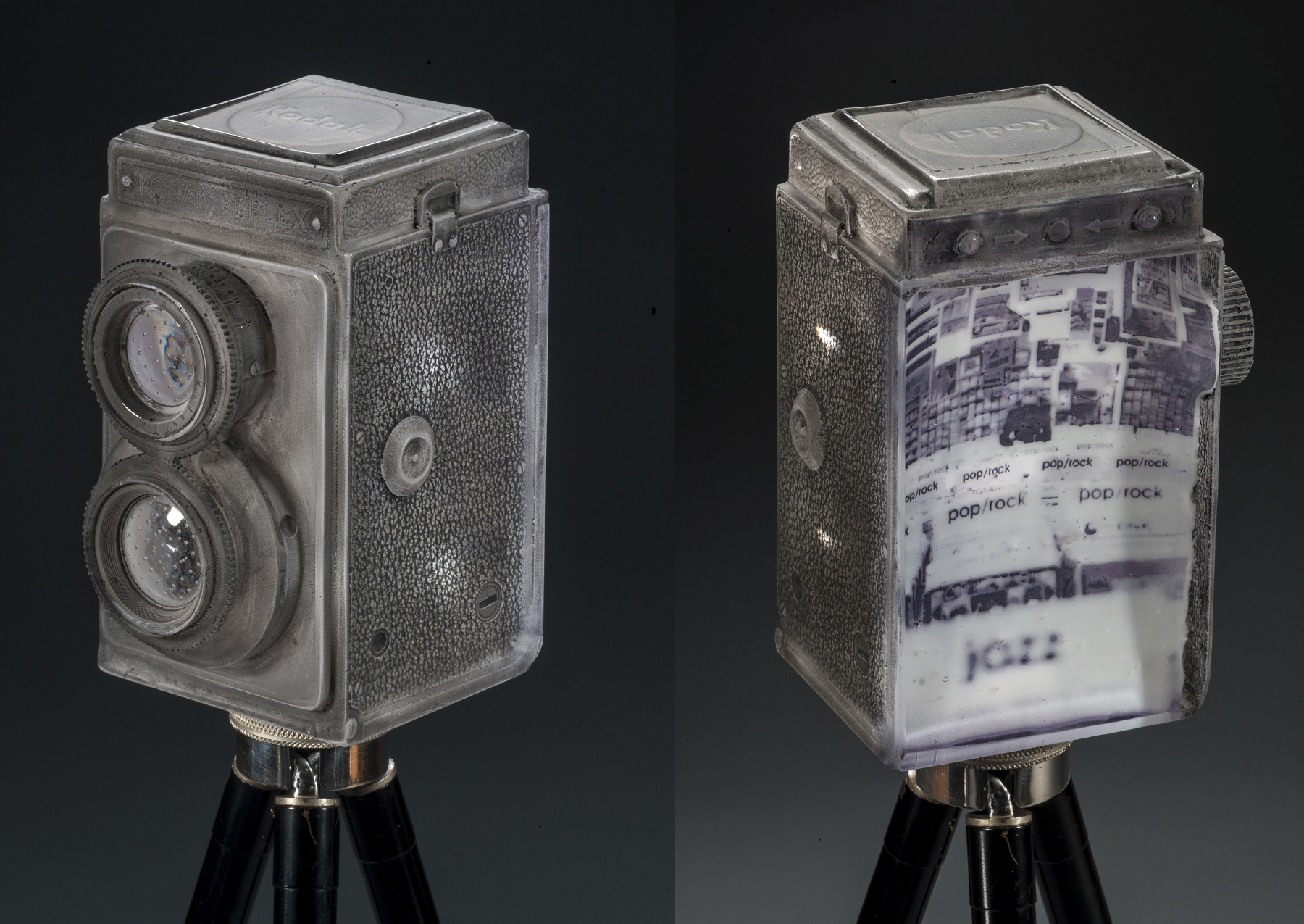 TITLE: Echoic Memory" (Barts) DATE: 2012 SIZE: 5"L x 4.75"W x 6.5"H MEDIUM: Glass, ceramic decal, paint, antique Kodak tripod, framed giclée print (not shown) METHOD: Lost wax casting, photography, encased ceramic decal layers, etched, painted, polished. PHOTO: Benjamin Corda