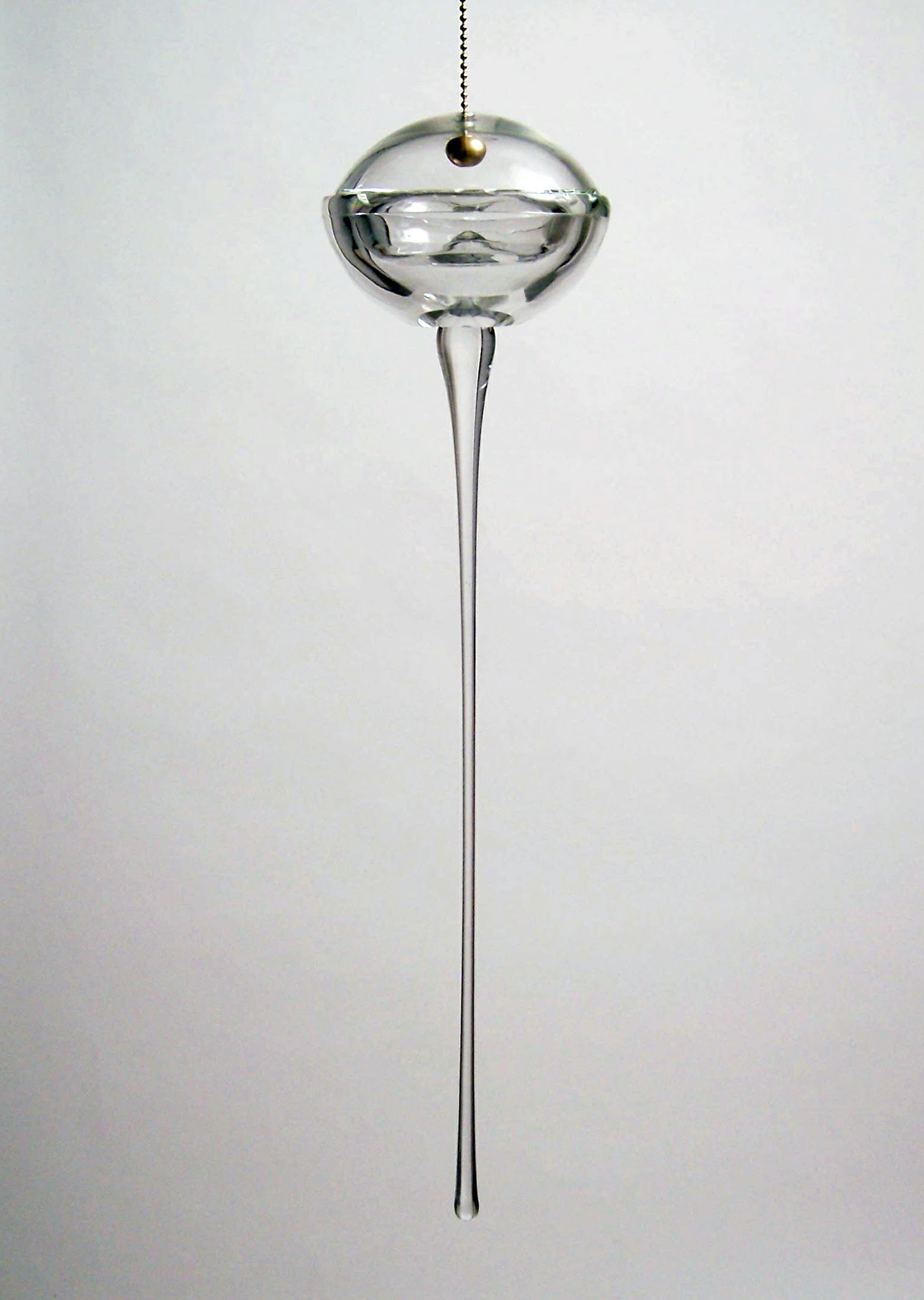 TITLE: “Messier Object #48” MEDIUM: Blown glass, Water, Brass METHOD: Blown glass, Laminated SIZE: 22”H x 7”L x 7W” DATE: 2015 PHOTO: Josh Hershman