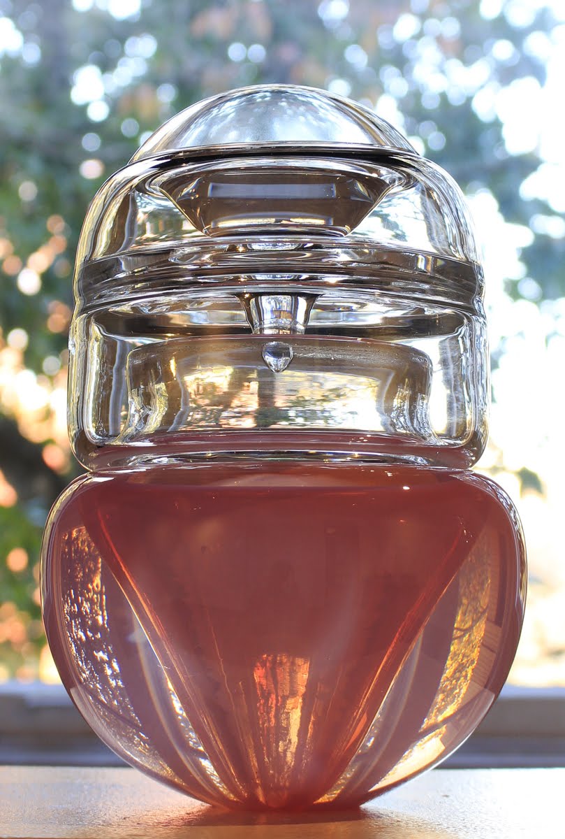 TITLE: Messier Object 32 MEDIUM: Glass, Mineral oil. METHOD: Blown glass, polished SIZE: 15”h x 8”w x 8”d DATE: 2017 PHOTO: Josh Hershman