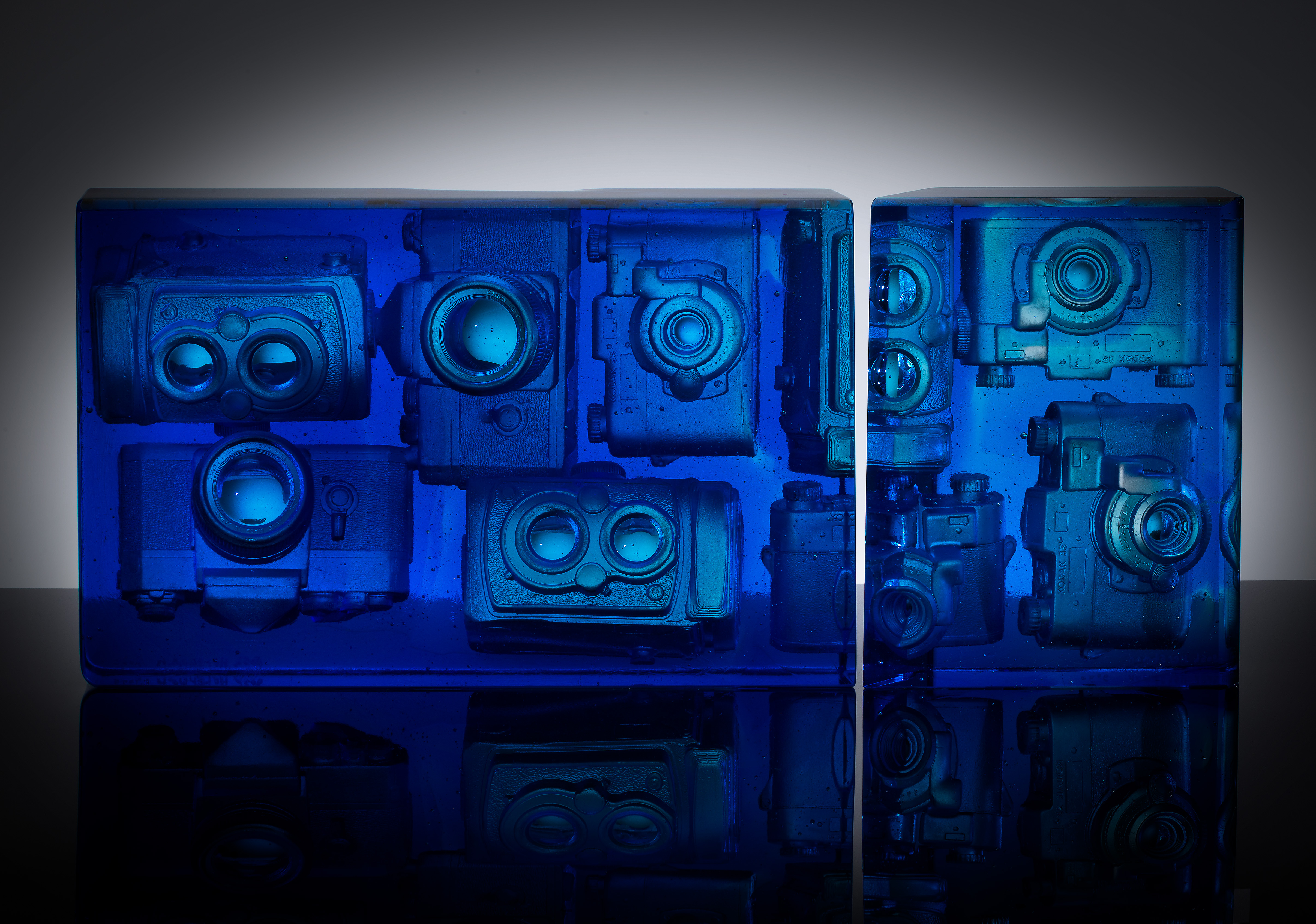 TITLE: Persistence of Vision MEDIUM: Glass METHOD: Negative core cast glass, polished SIZE: 9.75”h x 24.5”w x 10”d DATE: 2020 PHOTO: Keay Edwards